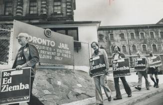 An early-morning protest against the jailing of MPP Ed Ziemba in Toronto (Don) Jail is led today by his brother, Joe (right), and Ivan Brown. He was s(...)