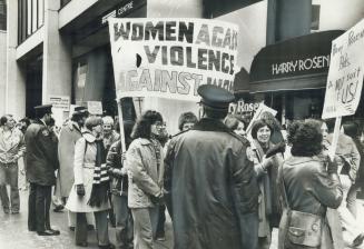 Store gets more than it bargained for, About 70 members of Women Against Violence Against Women group picketed a Harry Rosen men's wear shop on Bloor (...)