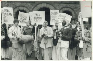 Krishna hold protest chant, About 100 chanting members of Hare Krishna movement held a rally outside Queen's Park today to protest provincial governme(...)