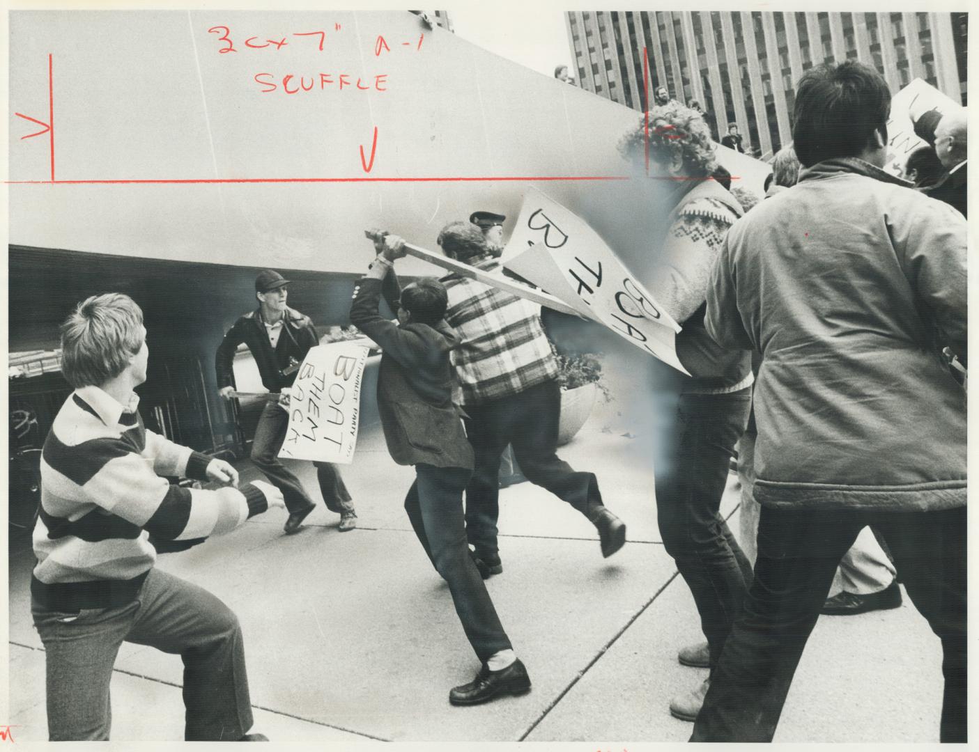 Protesters clash, Demonstrator takes a swing with a picket sign during a clash between left- and right-wing groups at a rally at Nathan Phillips Squar(...)
