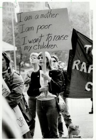 Want action: About 150 people demonstrated ouside Queen's Park Yesterday demanding higher welfare payments from Ontario, more public housing and free public transit