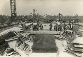 Construction workers on Bloor Street Viaduct, Deck looking east, June 25, 1917