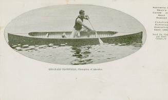 Black and white photograph of a man paddling a canoe.
