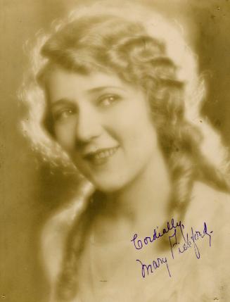 Sepia portrait of Mary Pickford with long curly hair.