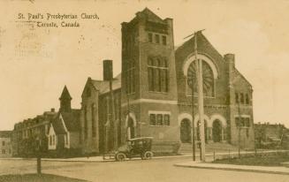 Image of a church building with a model A parked in front of it on a dirt road.