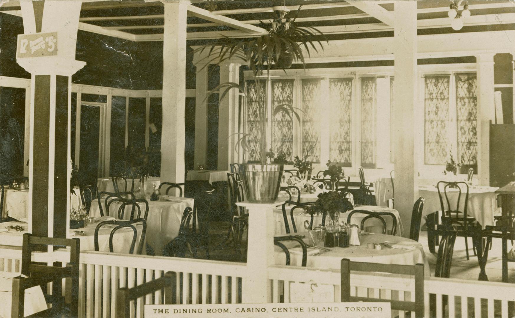 Shows the interior of a dining room.