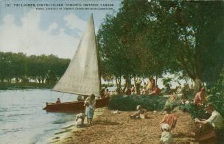 Colorized photograph of a group of people on a beach with a sail boat.