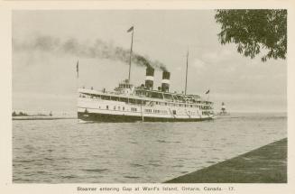 Black and white photograph of a large steamship on a body of water.