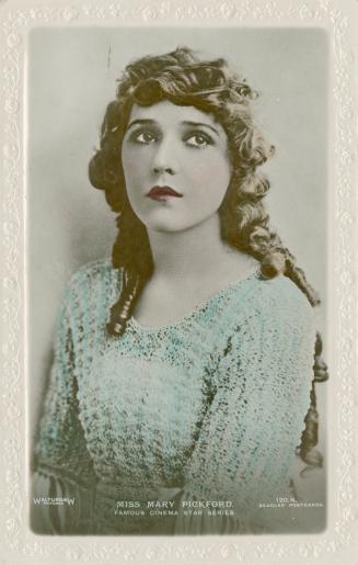 Hand colored picture of Mary Pickford in a loose dress.