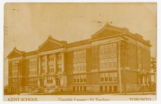 Sepia toned photograph a of three story school building with columns over the front entrance.