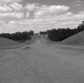 Bathurst St., looking north across West Don River, during construction of causeway
