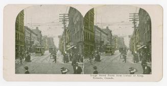 Pictures show a busy downtown street with pedestrians and street cars.