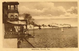 Sepia toned picture of a large body of water with sail boats and steam ships. Large Victorian b ...