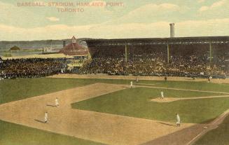 Colour photo postcard of the baseball stadium at Hanlan's Point, viewed from the third base lin…