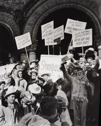 Grey Cup fans of the Montreal Alouettes and the Calgary Stampeders on the steps of Toronto City Hall, 1949