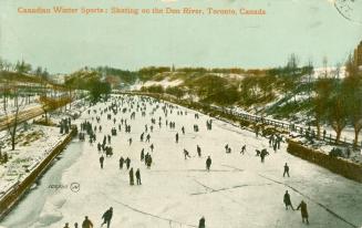 A very large group of people skating on a frozen river.
