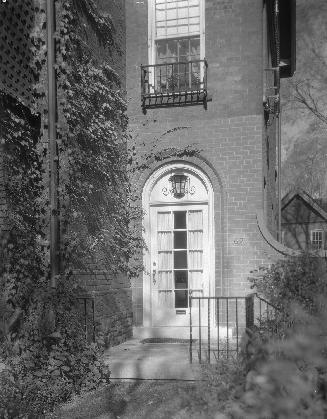 A photograph of an arched doorway of a house.