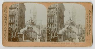 Pictures show an archway with a giant crown on top of it.