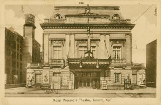 Sepia toned photograph of the front of a theatre.