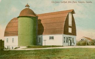 Colorized photograph of a huge barn with a green silo.