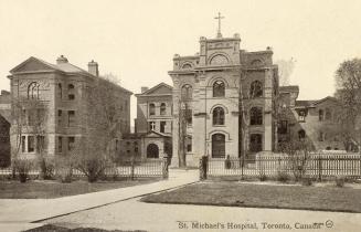 Black and white photograph of a hospital building.