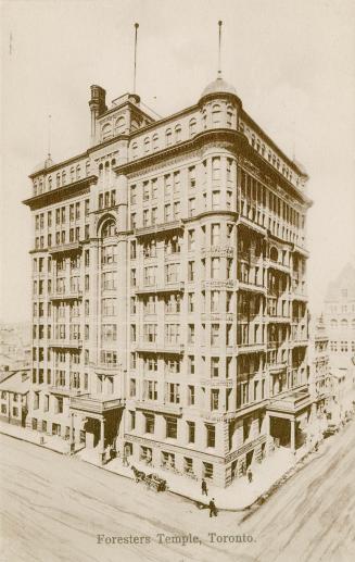 Black and white photograph of a large Victorian office building.