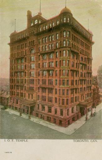 Colorized photograph of a large, Victorian office building.