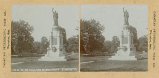 Pictures show a statue on top of a marble pedestal in park.