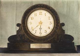 An illustration of a mantel clock, with the hands of the clock set at 6:38.
