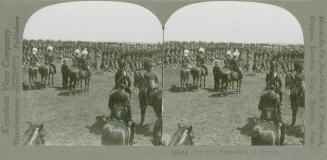 Pictures show a large group of soldiers on horseback.