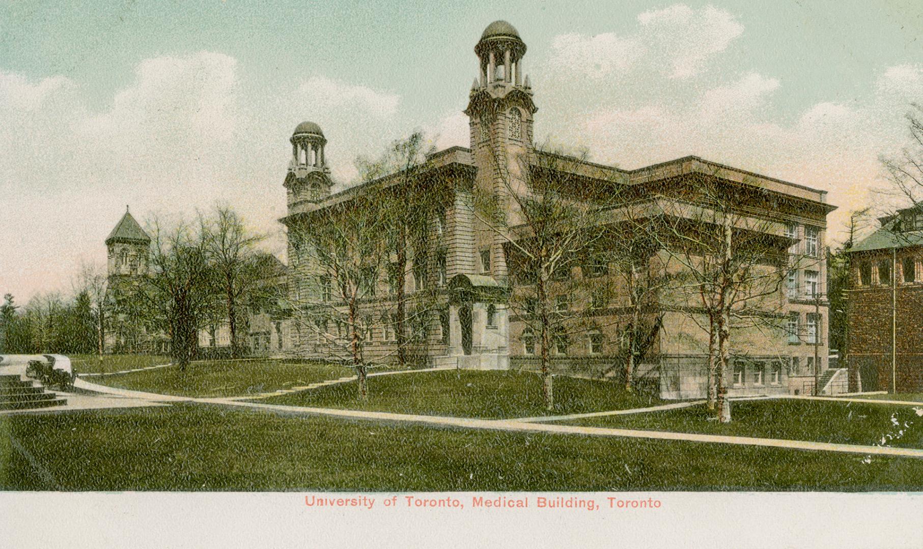 Colorized photograph of a large building with two towers.