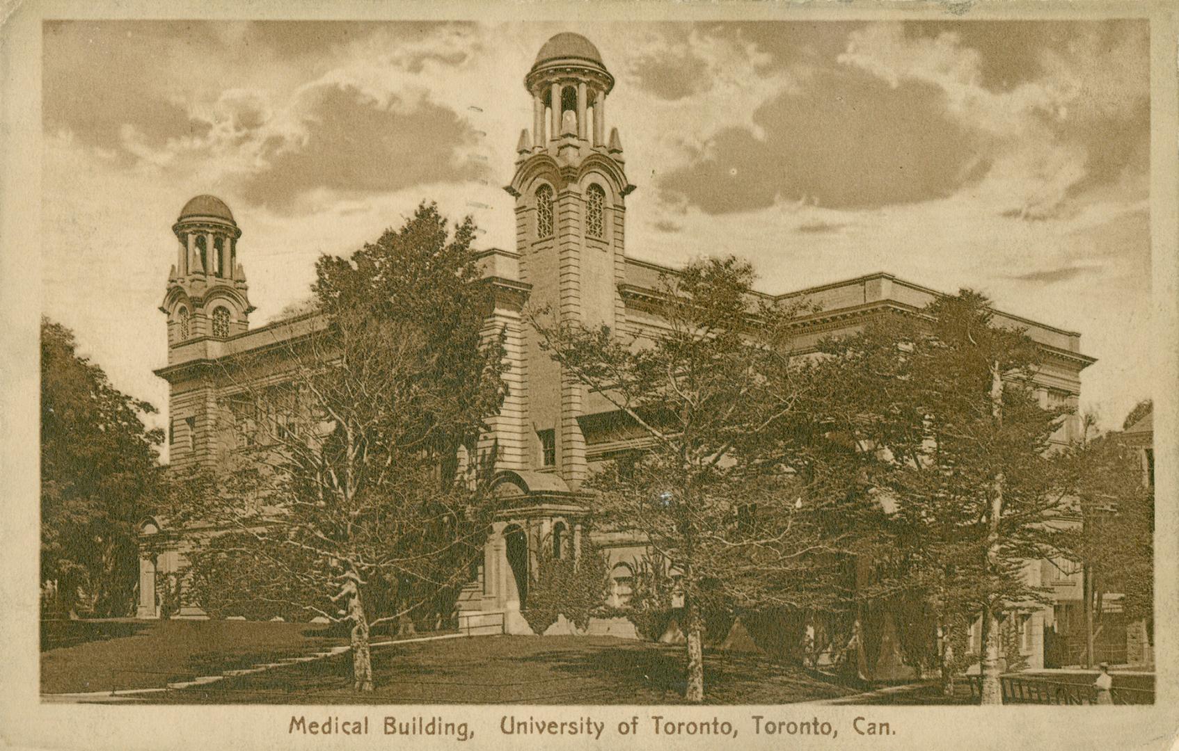 Sepia toned photograph of a large building with two towers,