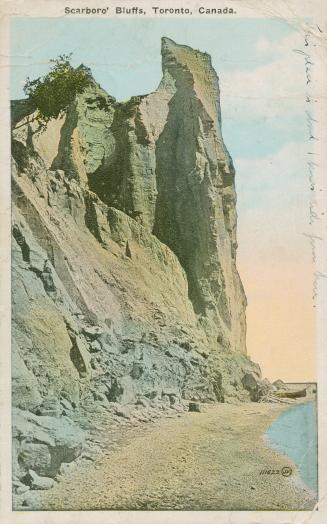 Colorized photograph of a cliff taken from the beach.