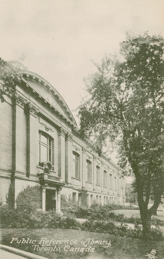 Black and white photograph of the front of a neo-classical public building.