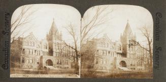 Pictures show the front of a huge Richardsonian Romanesque building.