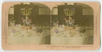 Pictures show a very formally laid table with a candelabra in the center.