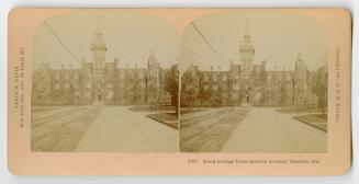 Pictures show a large, three story Victorian building with a central tower.
