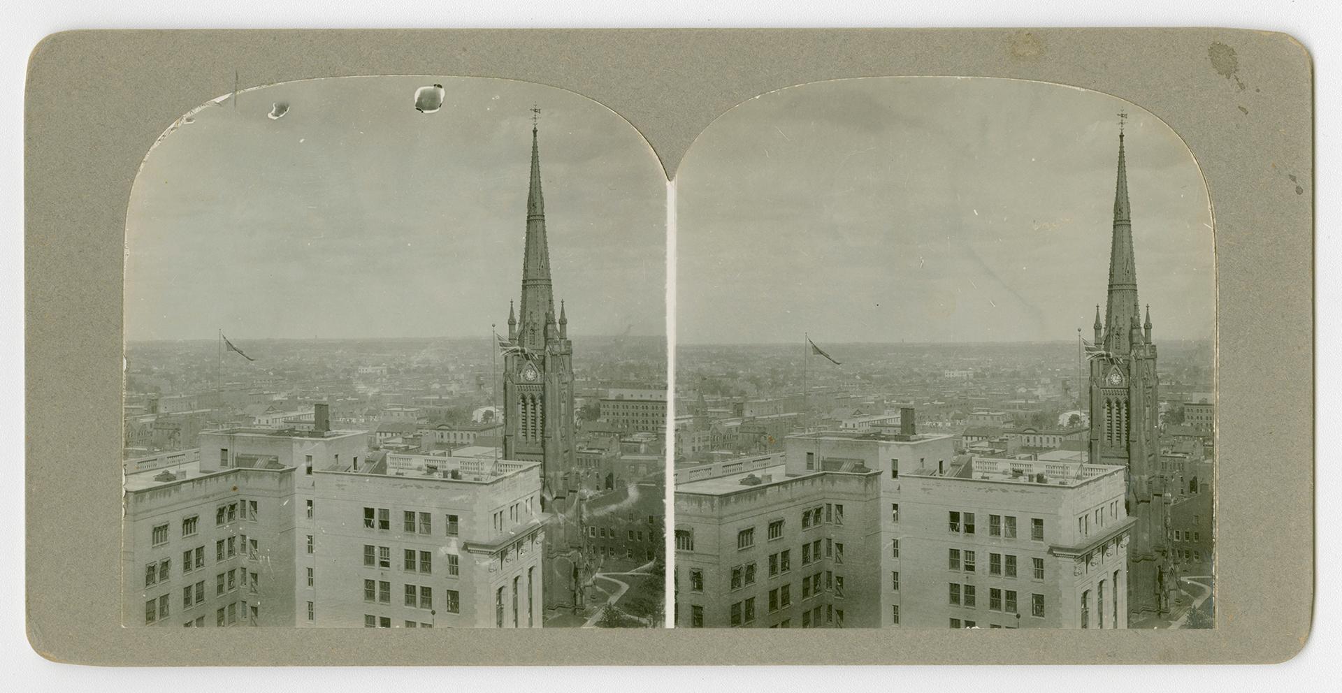 Ariel view of a city with a prominent church steeple
