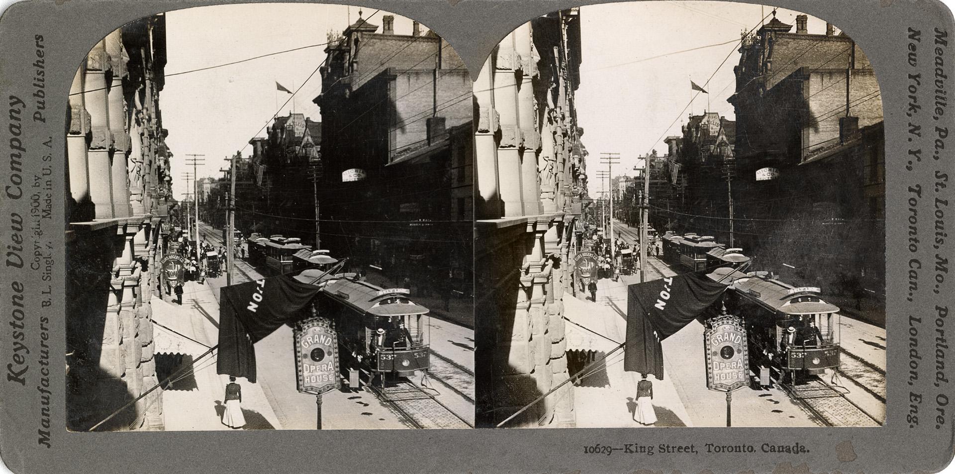 Stereoscopic photograph card of the view looking west along King Street from the Grand Opera Ho ...