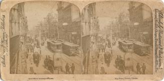 Stereoscopic photograph card of the view looking west along King Street from the Grand Opera Ho ...