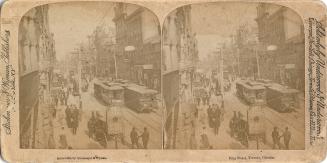 Stereoscopic photograph card of the view looking west along King Street from the Grand Opera Ho…