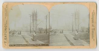 Pictures show people and a wagon on a road in front of of a Gothic style church.