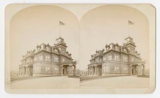 Pictures show a three story house with a central tower in the Second Empire style.