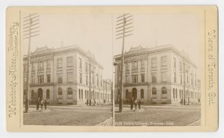 Pictures show two people standing in from of a three story stone public building. A sign on the ...