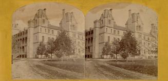 Pictures show a three story public building with many balconies.