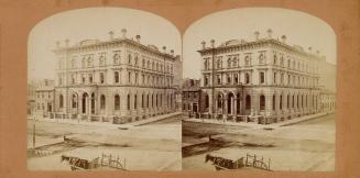 Pictures show a large three story stone building with a horse and wagon in front of it.