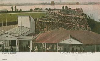 Picture of roller coaster and building attached to it with people in lineups. 