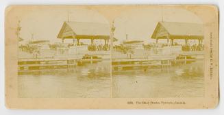 Pictures show people standing under a covered dock with water in front of it.