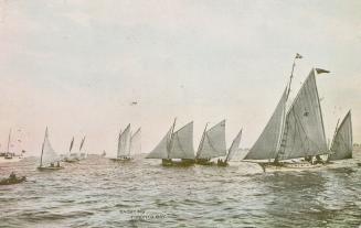 Colorized photograph of many sailboats on open water.