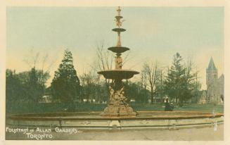 Elaborate fountain in Allan Gardens, with trees in the background. The Jarvis Street Baptist Ch ...